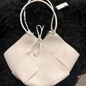 New with tags- Eggshell white woven purse from NY&CO